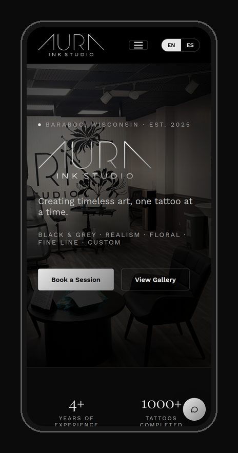Aura Ink Studio website on a phone